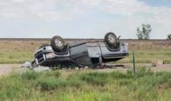 Driver flips Dodge Ram